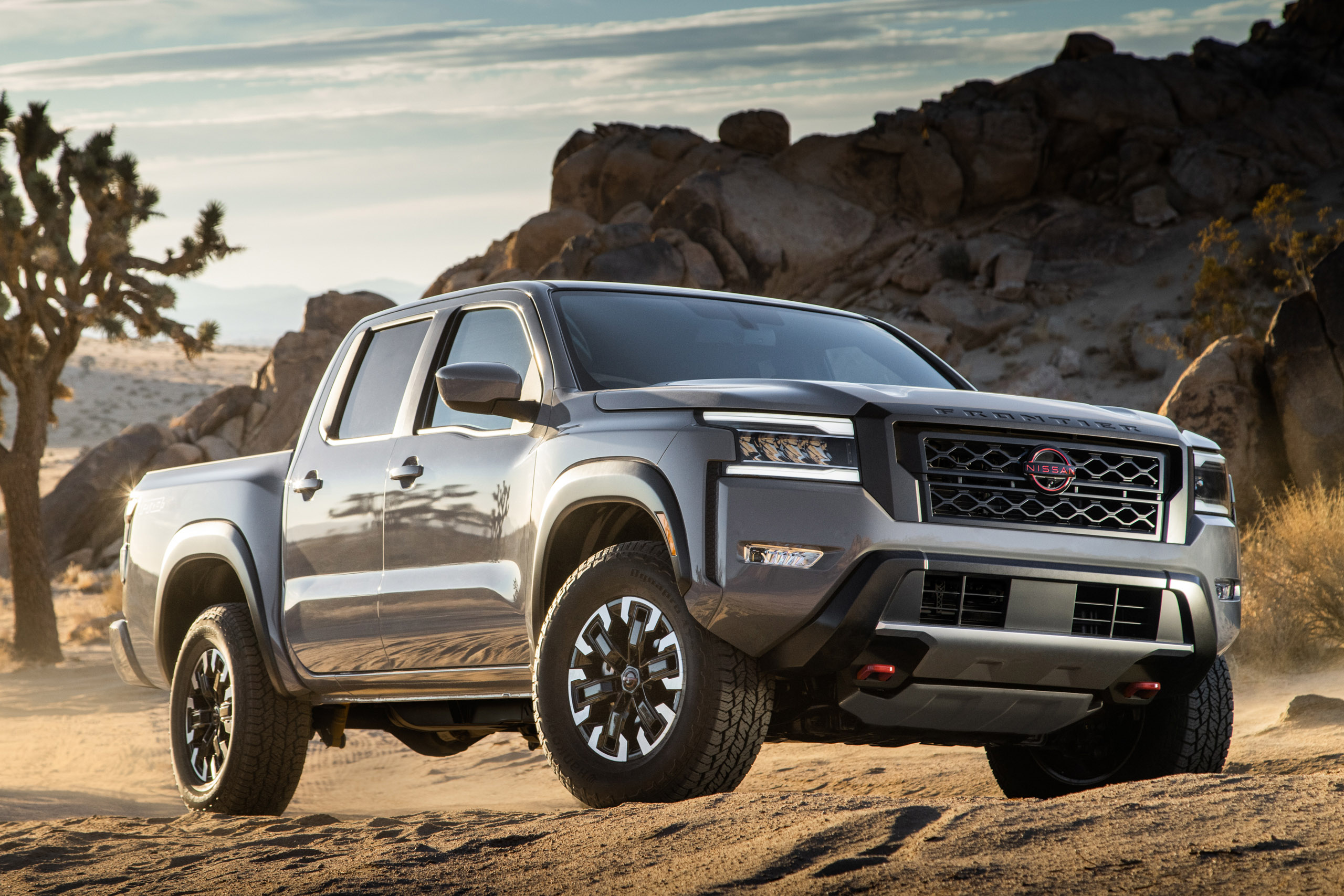 Ram 1500. Nissan frontier 2021. пикапы 2022. Dodge ram 1500 rebel. Gmc sierra 2022.